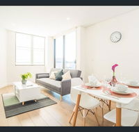 Gorgeous modern brand new two bedroom apartment with large lounge and private garden view balcony - Melbourne Tourism