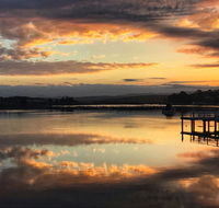 Reflections on Merimbula Lake - Melbourne Tourism