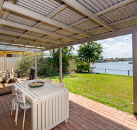 Lowset home on the canal - Dolphin Dr Bongaree - Melbourne Tourism
